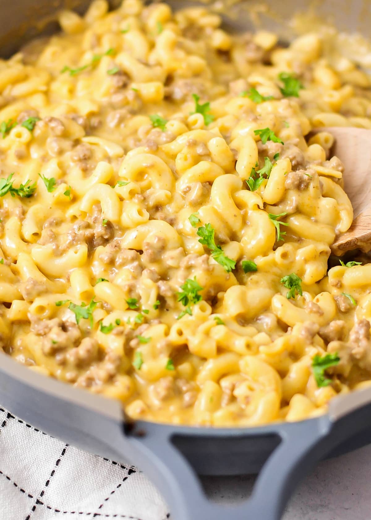 Better than the box, Homemade Hamburger Helper is a perfect one-pot meal that comes together in under 30 minutes! Close up of hamburger helper topped with parsley.