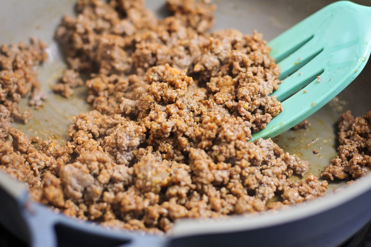 Better than the box, Homemade Hamburger Helper is a perfect one-pot meal that comes together in under 30 minutes! Browning ground beef in a skillet for homemade hamburger helper.